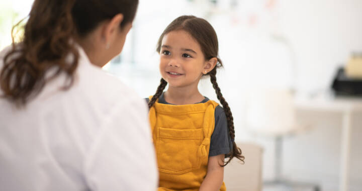 Child speaking to doctor