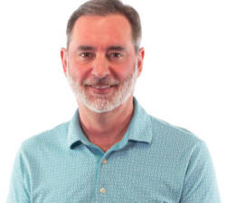 man wearing mint green polo shirt