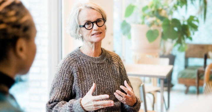 Woman speaking in group counseling session