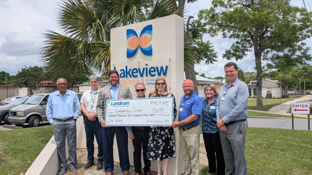Landrum joined Lakeview Center leaders to present a generous donation of $17,297, raised during the 2024 Landrum 5K.