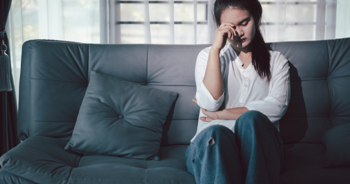 sad girl on couch