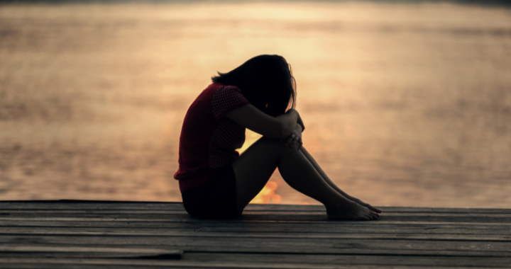 sad girl on pier