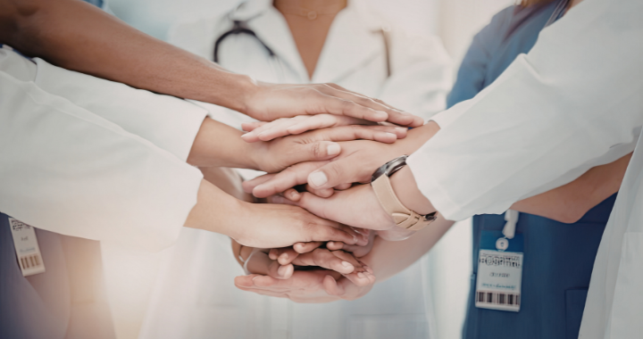 doctors holding hands